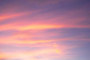 beautiful orange clouds  and sunlight on the blue sky perfect for the background, take in morning,Twilight photo