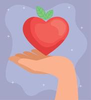 Manzana con forma de corazón levantando la mano vector