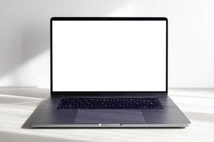 Modern laptop with blank white screen on minimalist desk photo
