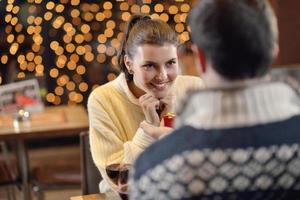 young man gives a gift to girl photo