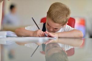 Boy doing homework photo