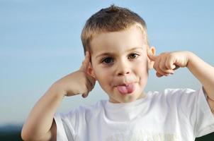 Boy enjoying outdoors photo