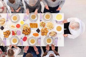 top view of modern muslim family having a Ramadan feast photo