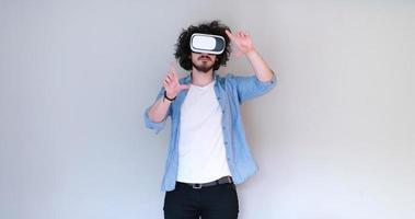 Man using headset of virtual reality photo