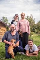 portrait of happy family at farm photo