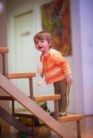 child playing with toys  at home photo