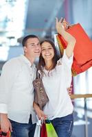 happy young couple in shopping photo