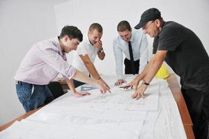 Team of architects on construciton site photo