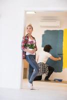 happy young couple doing home renovations photo