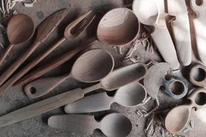 Handmade Wooden Spoons for hiking and outdoor activities. Craftsmanship and artisan concept photo