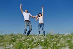 happy couple in wheat field photo