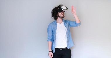 Man using headset of virtual reality photo