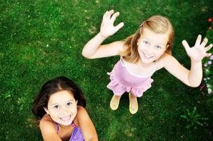 two happy girls have fun outdoor photo