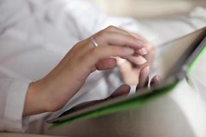 woman using tablet pc at home photo