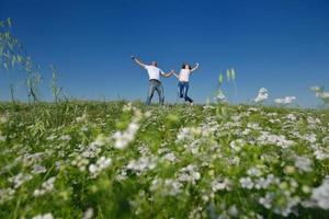 happy couple in wheat field photo