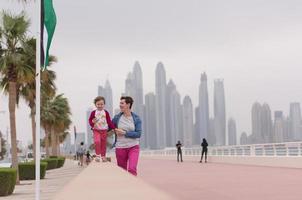 mother and cute little girl on the promenade photo