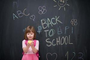 child holding apple photo