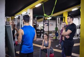 athletes getting instructions from trainer photo