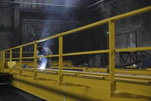 welder working indoors photo