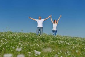 happy couple in wheat field photo