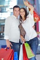 happy young couple in shopping photo