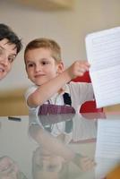 Boy doing homework photo