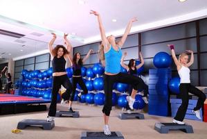 girls stepping in a fitness center photo