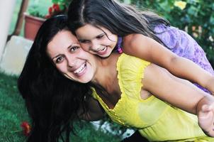 happy mom and daughter outdoor photo