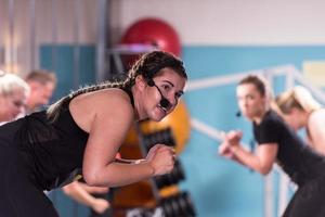 sporty women doing aerobics exercises photo