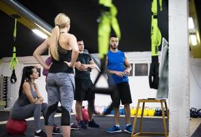 athletes getting instructions from trainer photo