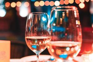 photo of two champagner glasses on table