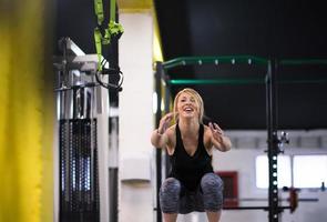 woman working out  jumping on fit box photo