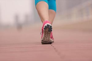 woman running on the promenade photo