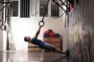 man doing dipping exercise photo