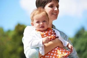 mother and baby in park photo