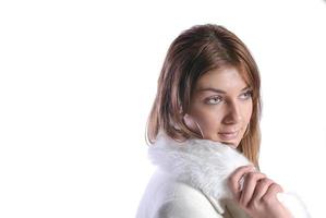 Isolated portrait of beautiful woman in a winter coat photo