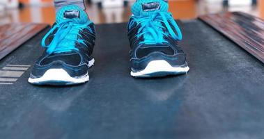 black female feet in sneakers photo