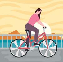 ciclista femenina en el paisaje marino vector