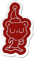 peaceful cartoon  sticker of a bear running wearing santa hat vector