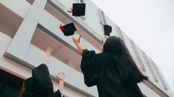 Group of friends having fun celebrating their graduation day. photo