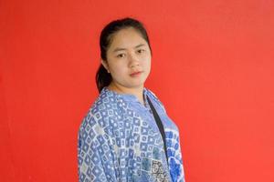 mujer asiática tomando retratos foto