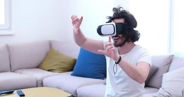 man using VR-headset glasses of virtual reality photo