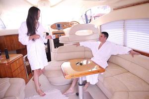 young couple on yacht photo