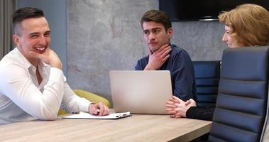 Startup Business Team At A Meeting at modern office building photo