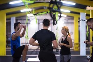 athletes working out  jumping on fit box photo