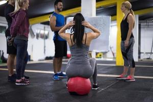 athletes getting instructions from trainer photo