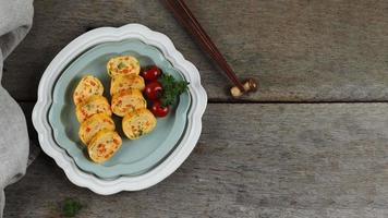 Gyeran Mari, Korean Rolled Omelette, one Various Savory Banchan Hansig Side Dish. photo