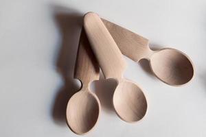 Handmade Wooden Spoons for hiking and outdoor activities. Craftsmanship and artisan concept photo