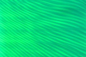 abstract blurred background of green ripples. photo