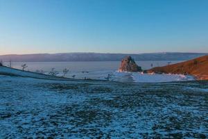 Cape Burkhan or Mount Shamanka at northern of Olkhon Island in Lake Baikal, Russia. photo